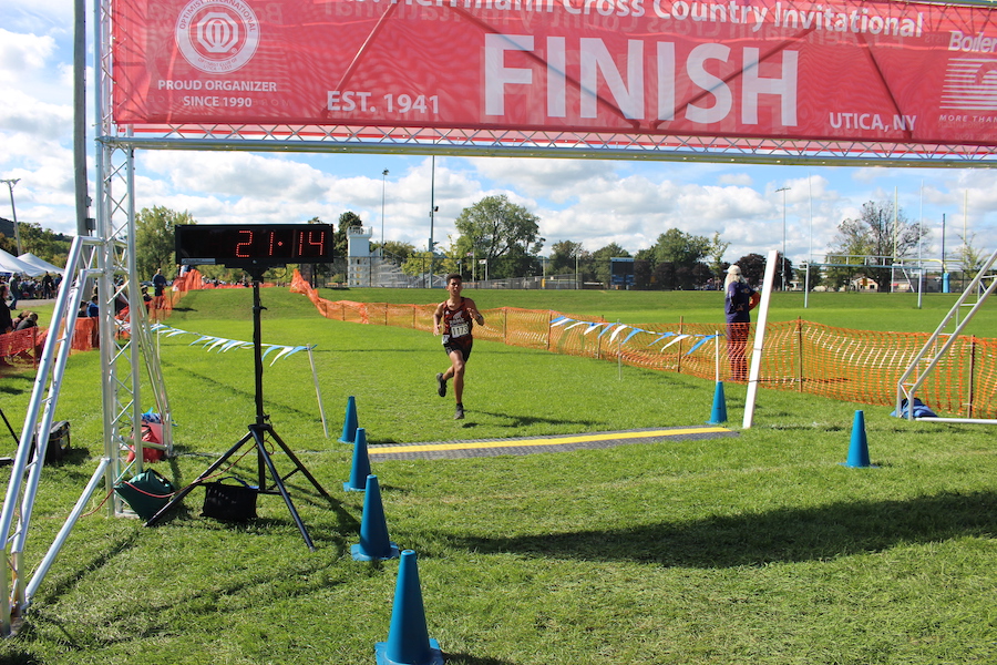 Image of the Brian Dodge Boys JV race winner Ellis III Pomales from Rome Free Academy