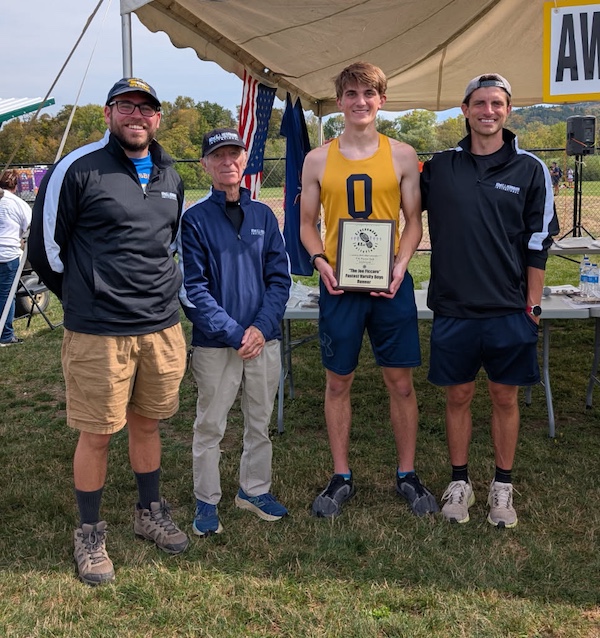 Image of the Joe Ficcaro Award award winner Chris Diplacido from Queensbury, presented by Mr. Santo Paniccia