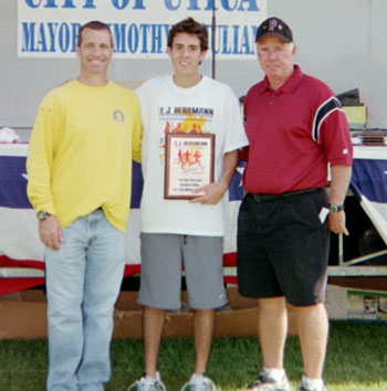 Image of Andrew Corcoran receives the Joe Ficcaro Award for the fastest elite/varsity male runner