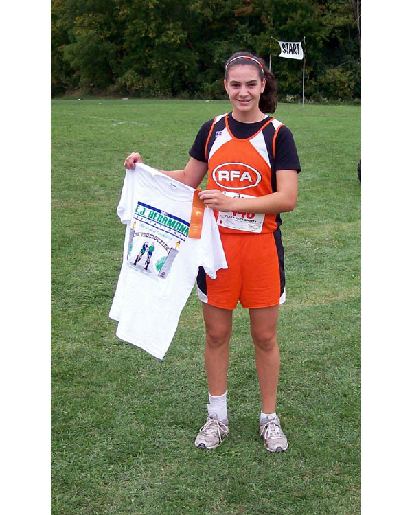 Image of the Monsignor Francis J. Willenburg Girls Modified race winner Tricia Loso from Rome Free Academy