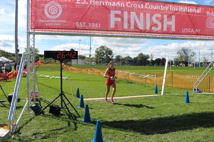 Image of the Utica Police and Fire Fighters Memorial Girls JV race winner Fiona Carey from Rome Free Academy