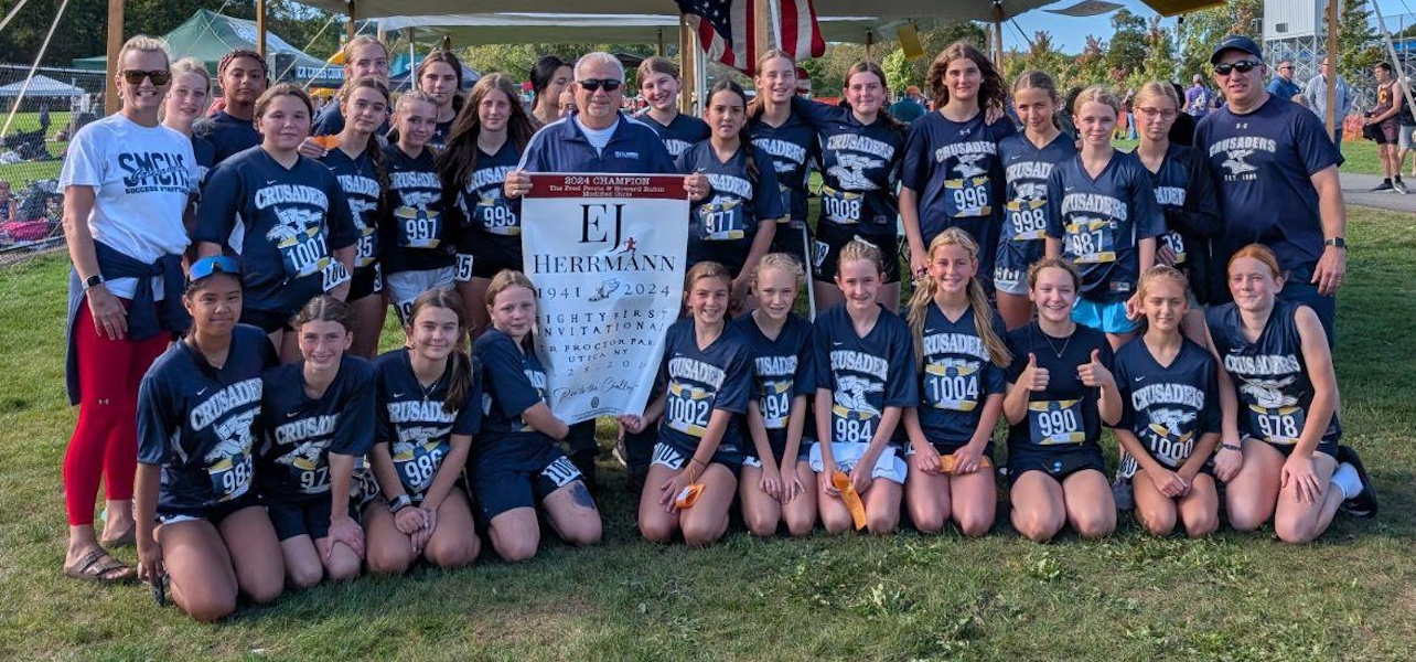 Image of the Fred Ferris and Howard Rubin Girls Modified winning team St. Mary - Brockville, presented by Mr. Mello Testa