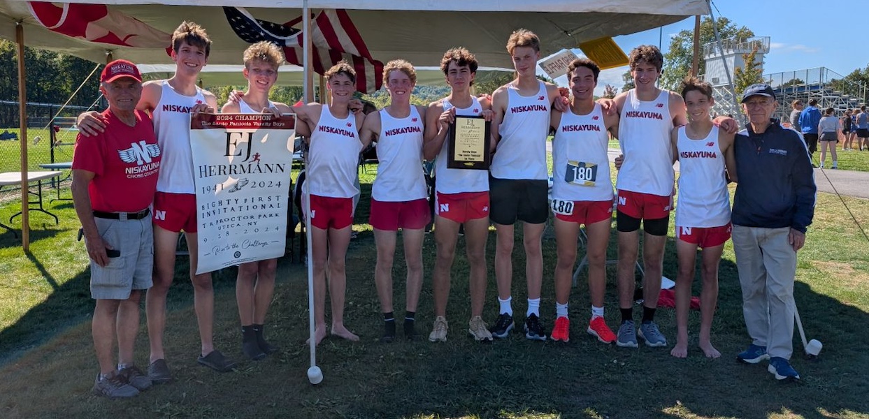 Image of the Santo Paniccia Boys Varsity winning team Niskayuna, presented by Mr. Santo Paniccia